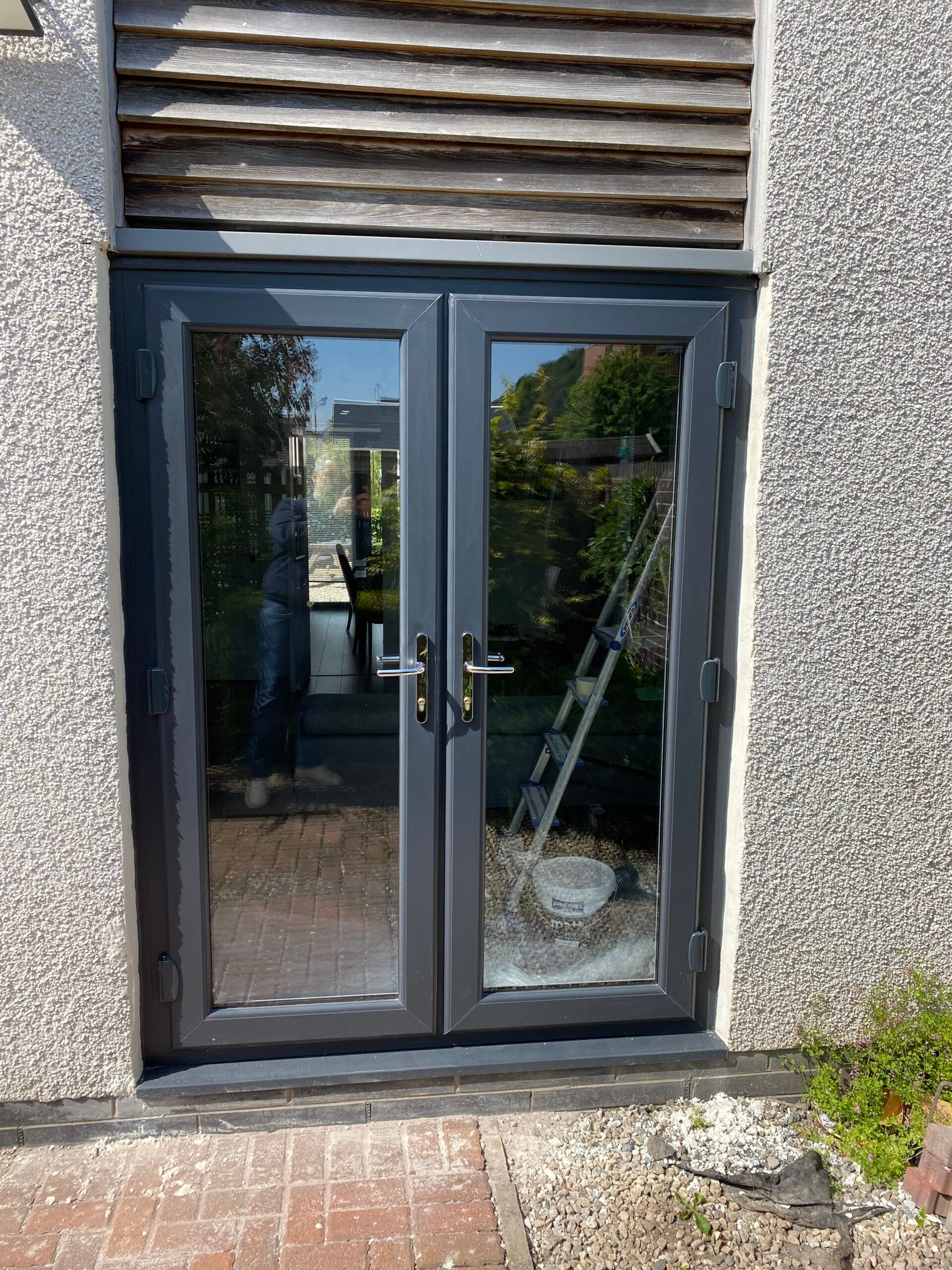 Bright room behind energy-efficient French doors