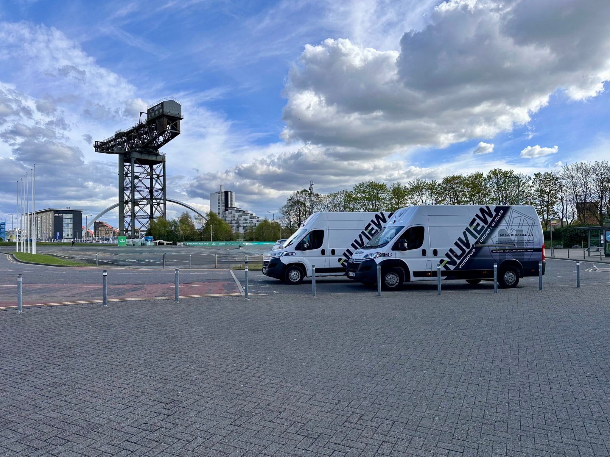 NuView vans on the Clyde by the Finnieston Crane, Glasgow