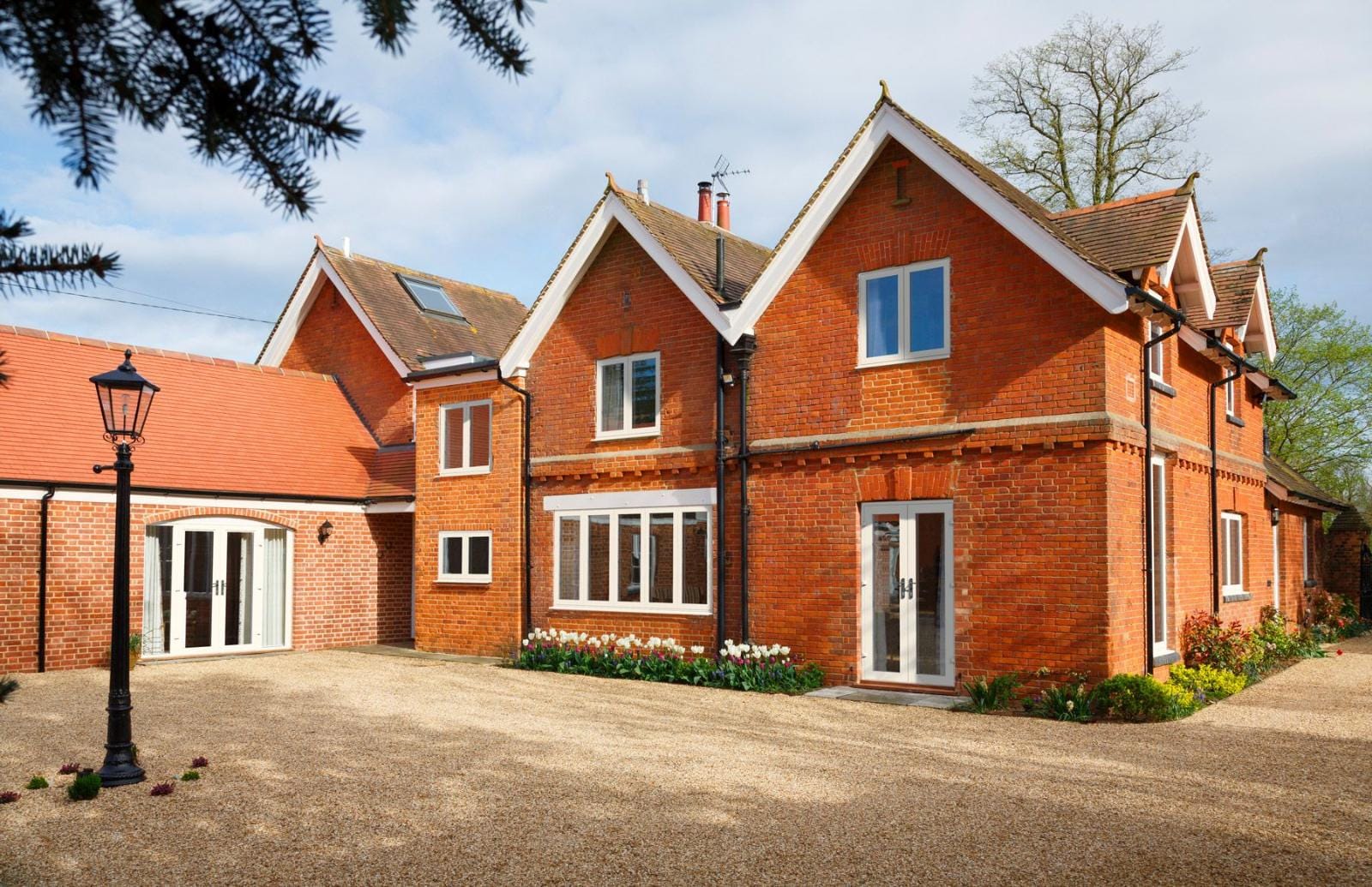 Aluminium windows on red brick houses