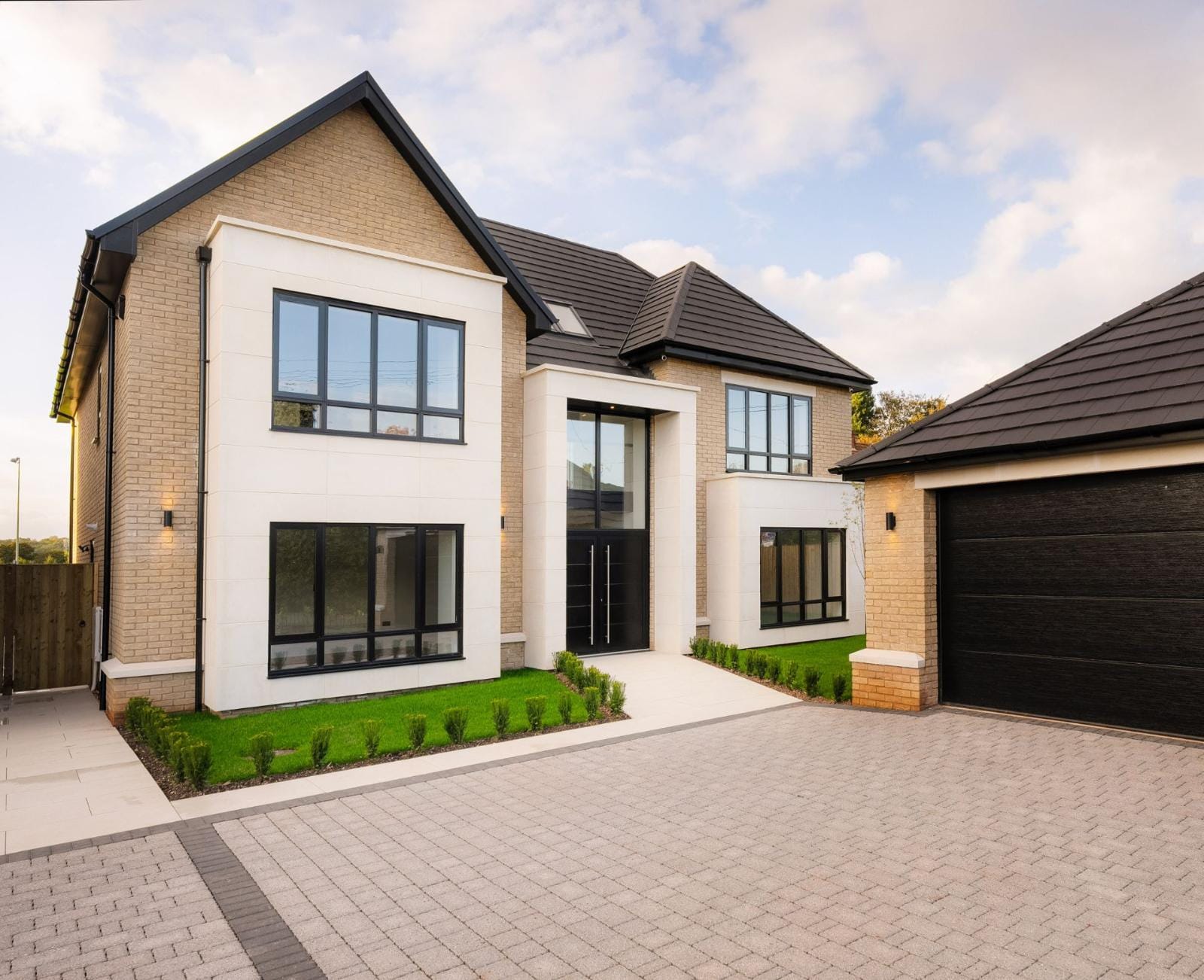 Anthracite grey Sheerline Prestige aluminium windows on a modern house