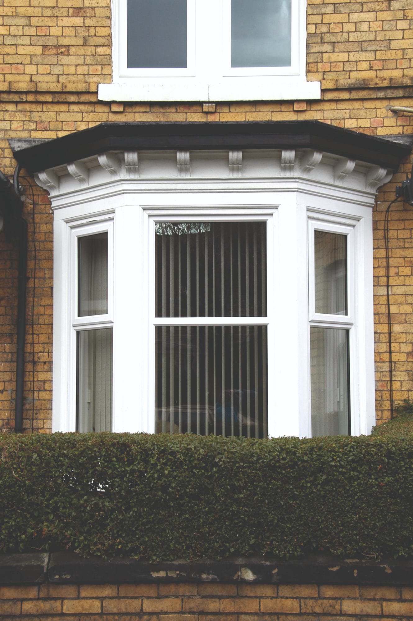 White bay window - fitted on a home exterior
