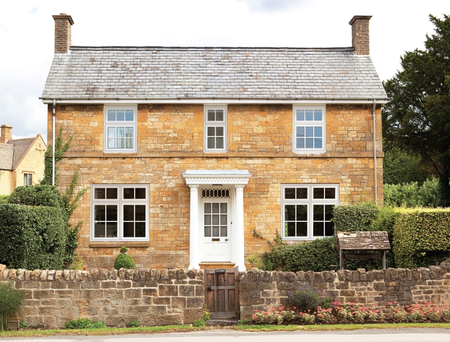 White flush sash window - fitted on a home exterior