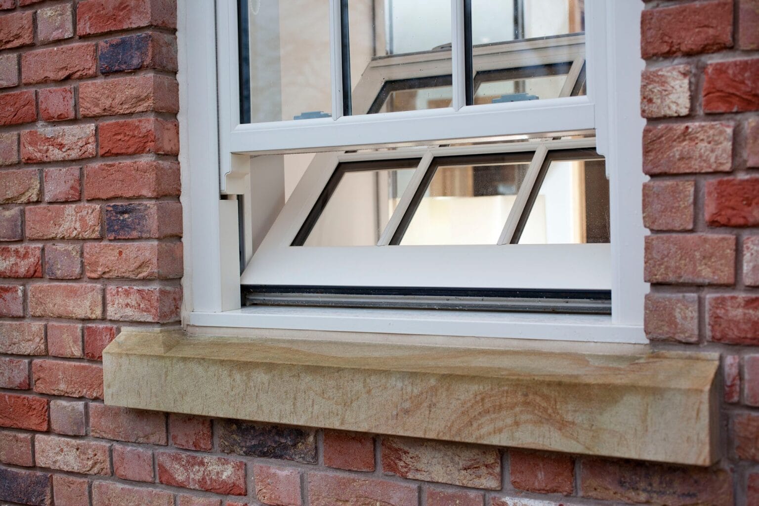 UPVC sash and case window - fitted on a home exterior