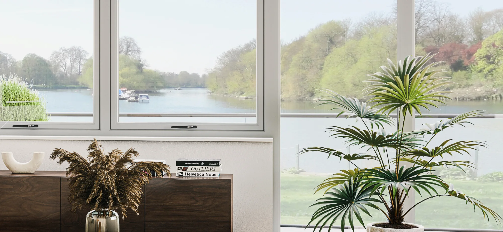 White VEKA fully reversible windows in a bright living room overlooking a river